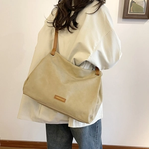 Large khaki leather tote bag with brown straps and logo, casual vintage shoulder bag