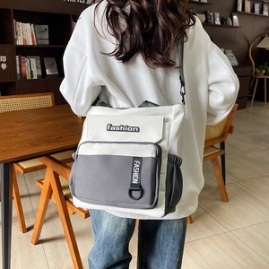 Minimalist color-block nylon crossbody bag with adjustable strap and fashion lettering