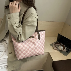 Pink and white plaid canvas tote bag with brown leather straps for autumn office commute