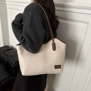 Vintage large capacity cream tote bag with brown contrast trim and leather texture