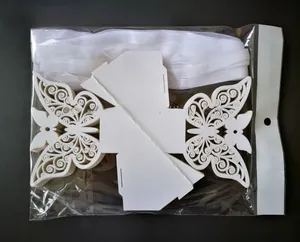 Detail of laser-cut butterfly gift box pieces with satin ribbons in 50-piece set
