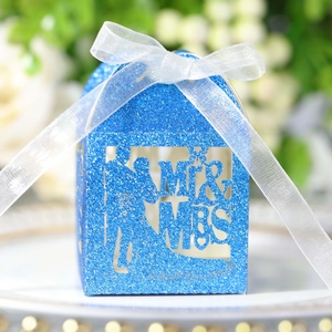 Blue glitter laser-cut wedding favor box with Mr & Mrs silhouette and white ribbon