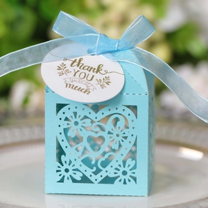 Light blue hollow heart laser-cut candy gift box with elegant ribbon and thank you tag