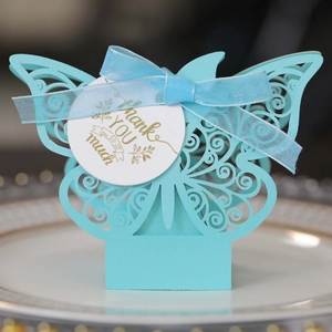 European style butterfly laser cut candy box in blue with ribbon and thank you tag