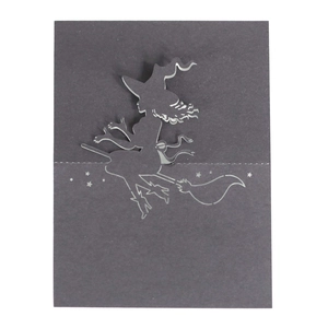 Creative Halloween place card with 3D laser cut silhouette of a witch flying on a broom