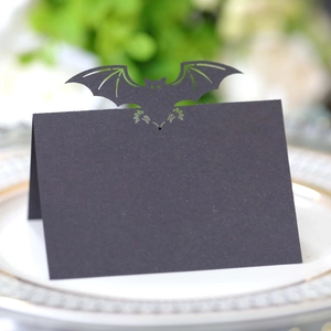 Halloween black bat wing place card with laser-cut hollow design for party table decor