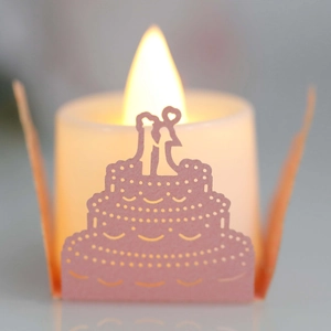 Pink laser-cut cake lampshade for LED candles featuring a romantic wedding silhouette