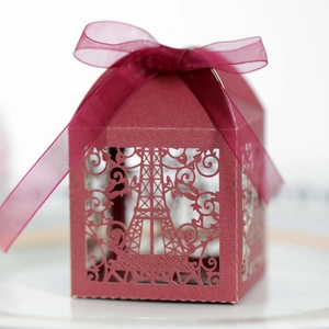 Elegant wine red laser cut gift box featuring an Eiffel Tower design and organza ribbon