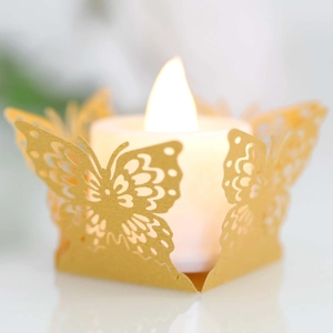 Cache-bougie papillon doré découpé au laser avec bougie LED pour décoration de mariage