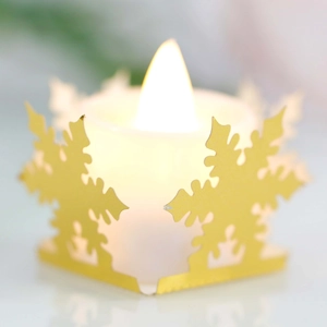 Golden snowflake hollow lantern with LED candle holder for Christmas festive tabletop decor