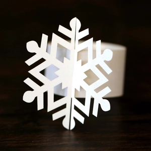 3D white snowflake napkin ring holder with hollow design and glitter finish for Christmas