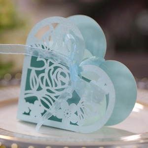 Laser cut heart shaped wedding favor box in pearl light blue with elegant rose patterns