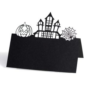 Halloween table cards with laser-cut pumpkin, haunted castle and spider web design