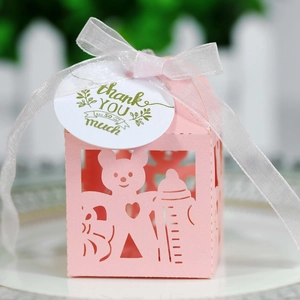 Pink bear baby shower favor box with laser-cut hollow design and white ribbon bow