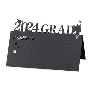 Detail of 2024 graduation laser-cut black place card with 2024 GRAD silhouette