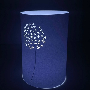 Blue cylindrical laser-cut hollow dandelion lampshade with warm LED glowing effect