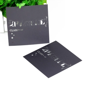Detailed laser-cut black 2024 graduation place cards with graduation cap and silhouette