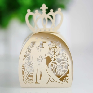 Elegant laser cut champagne gold wedding candy box with crown top and couple silhouette