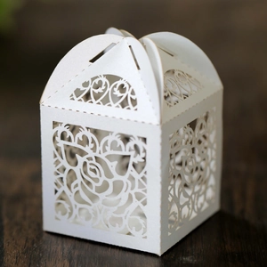 Detailed laser-cut rose pattern on elegant white European style wedding candy box