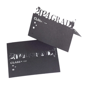 Laser cut black 2024 graduation place cards with student silhouette and star details