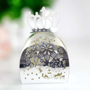 Silver laser-cut crown candy box with intricate floral patterns for weddings