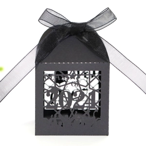 Detailed laser-cut Class of 2024 text and graduation silhouettes on a black gift box
