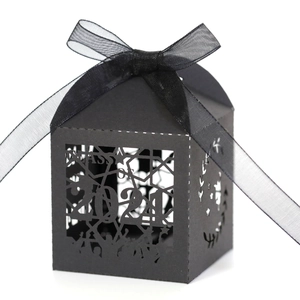 Detailed laser-cut Class of 2021 hollow candy box with black organza ribbon and star patterns