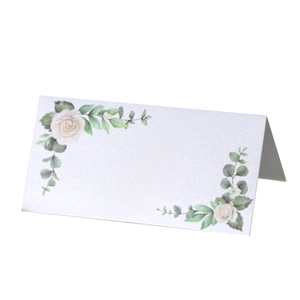 Elegant white floral place cards with rose patterns for wedding table seating