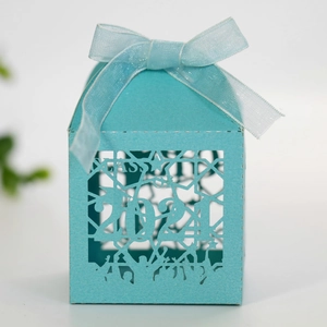Close-up of laser-cut 2024 graduation candy box in tiffany blue with ribbon bow