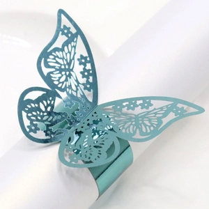 Teal butterfly paper napkin ring with laser-cut hollow pattern for elegant table setting