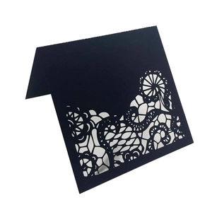 Elegant black laser cut hollow lace place cards for weddings and events on white background