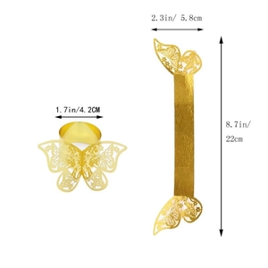 Golden laser-cut butterfly napkin ring showing curled form and unfolded dimensions