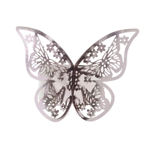 Laser-cut hollow butterfly napkin ring with purple pearlescent finish and circular stand