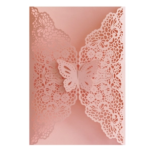 Elegant pink laser-cut butterfly invitation card with intricate floral lace patterns