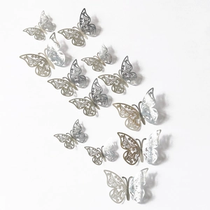 Set of 12 3D hollow mirror silver butterfly wall stickers with intricate floral laser patterns