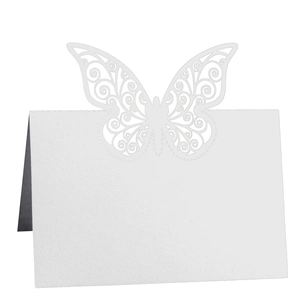 Laser cut butterfly name place cards for weddings in elegant white pearlescent paper