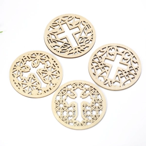 Set of four circular laser-cut wooden coasters with intricate cross design and hollow patterns