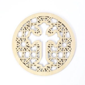 Laser cut wooden cross coaster with intricate geometric patterns for table decor