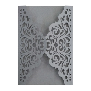 Elegant laser cut silver grey pearl paper invitation card with intricate floral pattern
