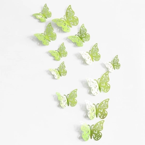3D hollow butterflies in light green and white for wall decor and party arrangements