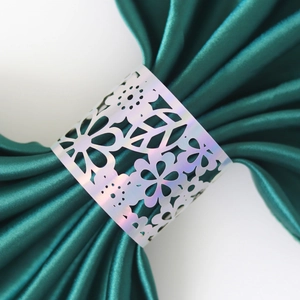 Hollow out laser cut pink mirror napkin ring with floral design and green satin towel