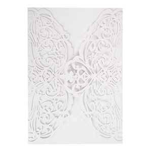 Elegant white laser-cut wedding invitation sleeve with intricate floral vine patterns