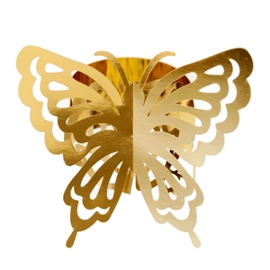 Detailed view of a golden butterfly napkin ring with hollow laser cut mirror finish