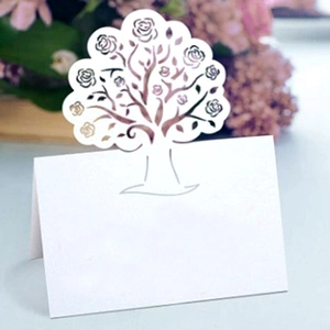 Elegant white laser-cut rose tree place card for weddings with delicate hollow design