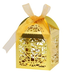 Golden laser-cut hollow gift box with cross pattern and yellow ribbon for wedding favors