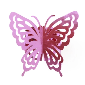 Macro detail of laser-cut butterfly napkin ring in pearlescent deep pink cardstock