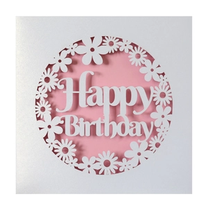 Elegant laser-cut Happy Birthday card with daisy patterns on pink and white paper