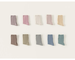Close-up of ten-color set of ribbed knit mid-calf socks in soft Morandi pastel tones