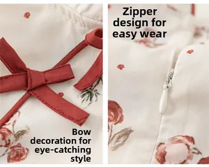 Dettagli di un vestito floreale con rose rosse e cerniera invisibile sul retro