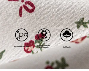 Macro detail of soft floral cotton fabric showing skin-friendly and breathable texture